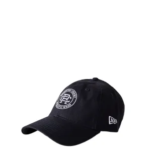 REIGNING CHAMP X NEW ERA 9TWENTY CREST CAP NAVY